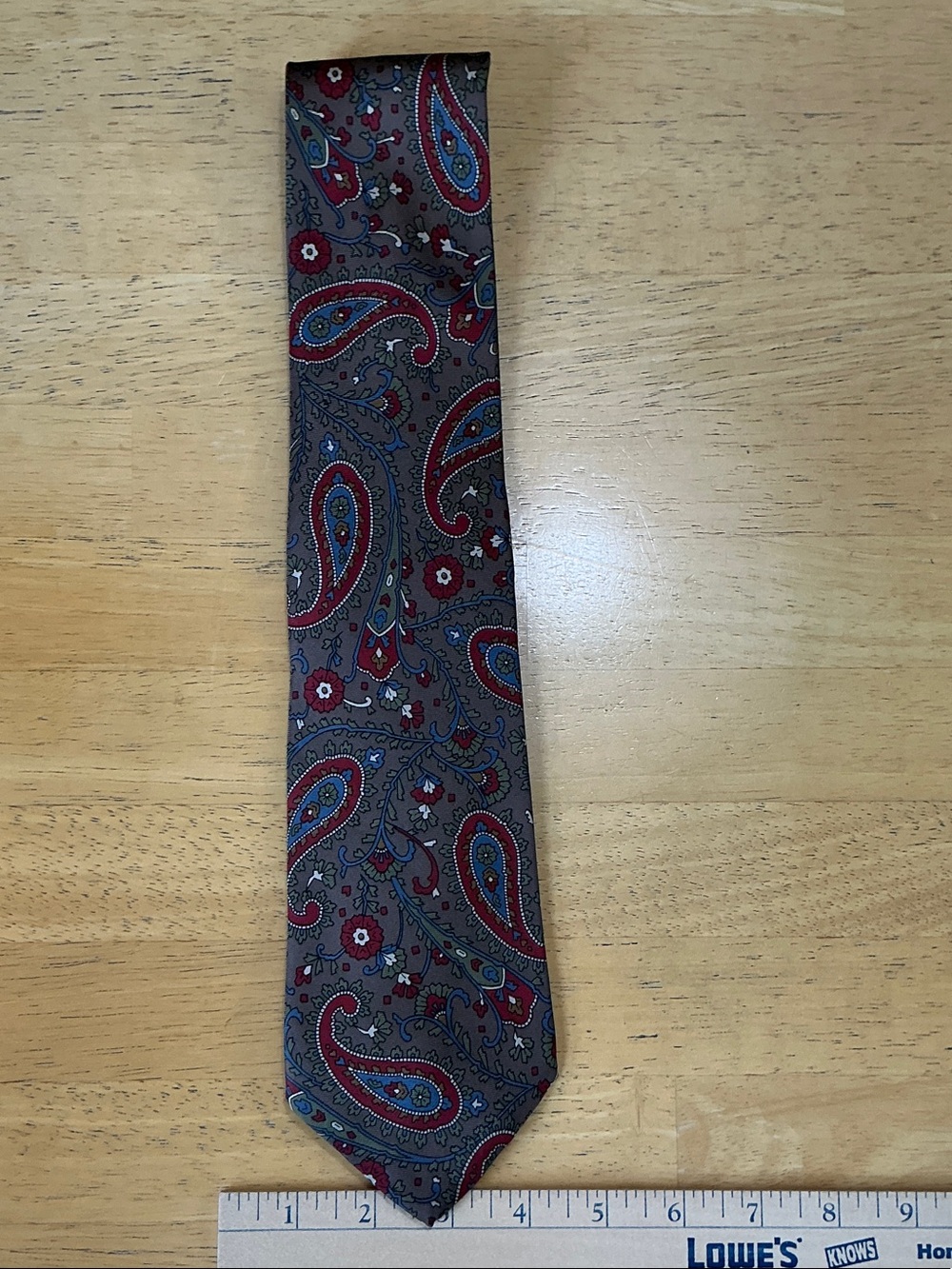 Classic Brown Paisley Men's Tie with Red and Blue Accents